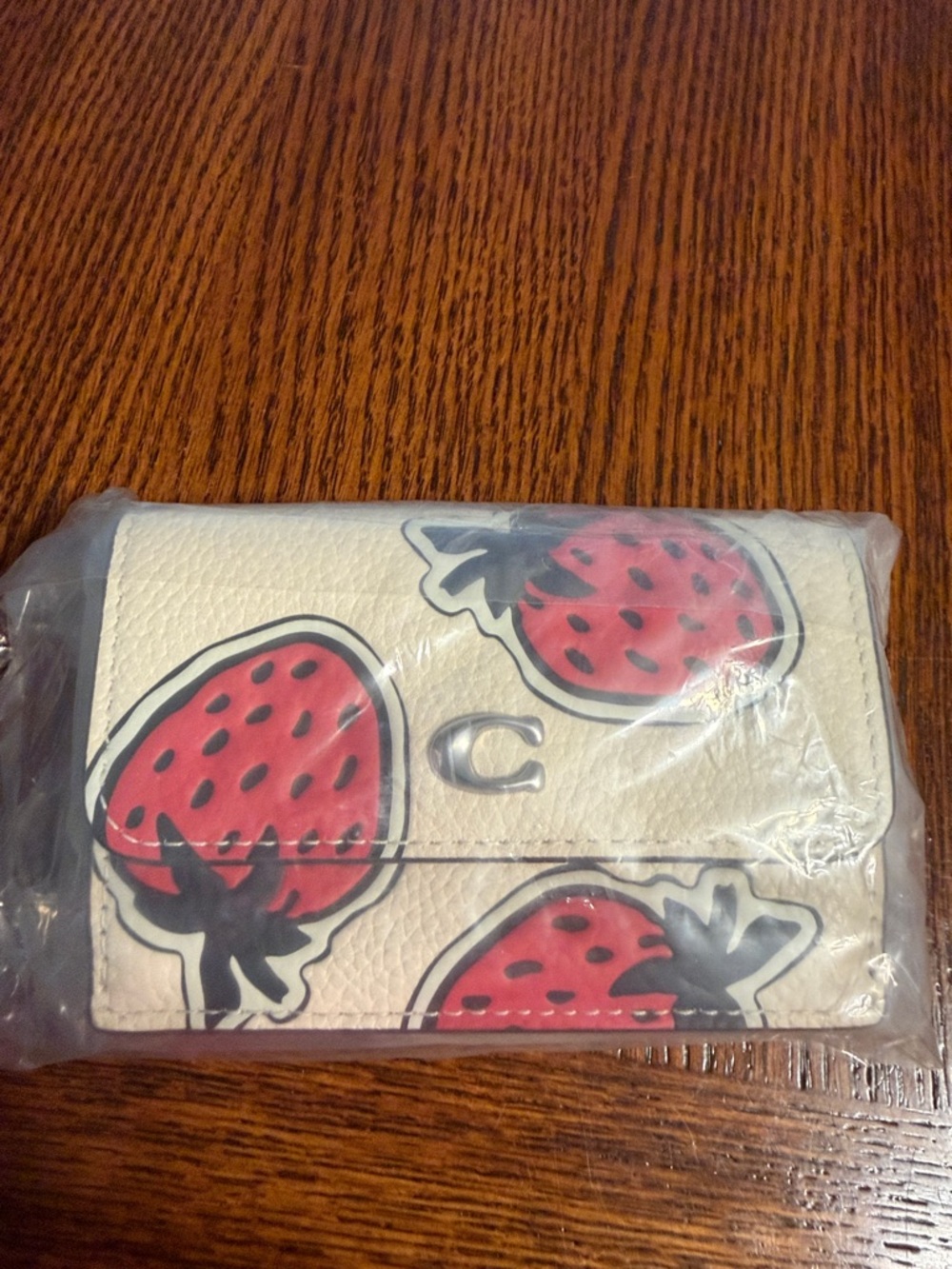 Coach Cream Leather Wallet with Red Strawberry Motif
